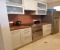 Fully furnished kitchen with washing washine, dish washer, kettle and toaster