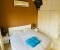 Bedroom with double bed and air condition 