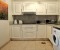 Fully equipped kitchen with washing machine, microwave, toaster, kettle and coffee machine