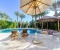 Private pool with sun loungers and poolside bar