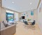 Beautifully decorated living room and dining area.