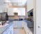 Kitchen with dishwasher, gas cooker, oven and microwave 