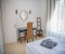 Bedroom 2 with a dedicated workspace and mirror
