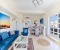 Large living room with dining area, open kitchen and access to the terrace