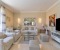 Tastefully designed living room with large smart TV