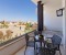 Balcony with table and chairs