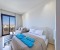 Cozy living room and sleeping area, with access to the balcony