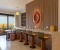 Bar with dining table and balcony view