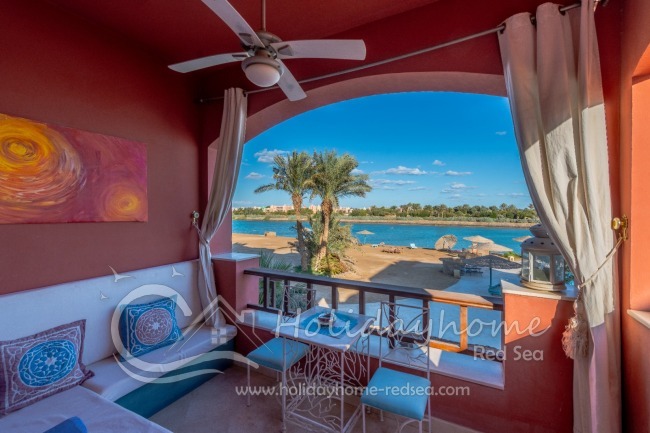 Balcony with seating and view of the lagoon