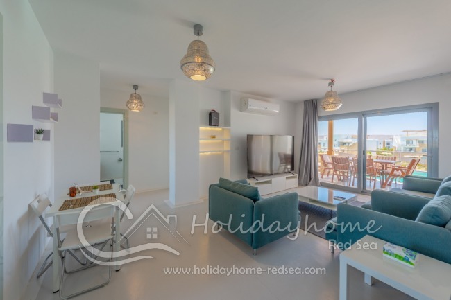 Lightful modern living room with breakfast corner