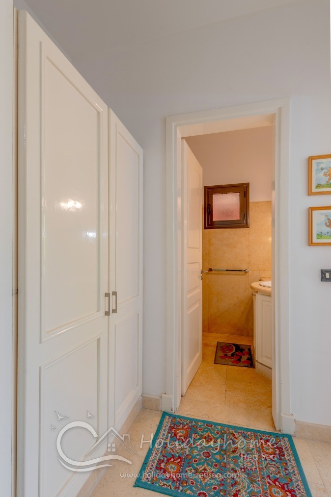 Entrance to the bathroom with shower