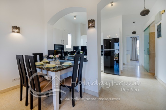 Spacious dining area with kitchen access