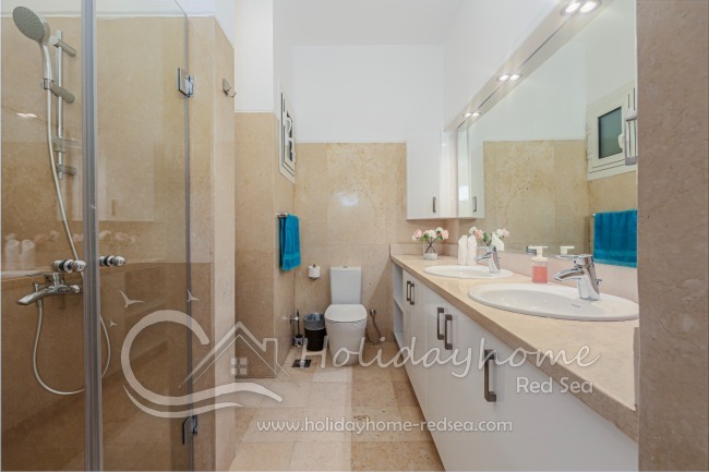 Dual sink brand new bathroom with shower