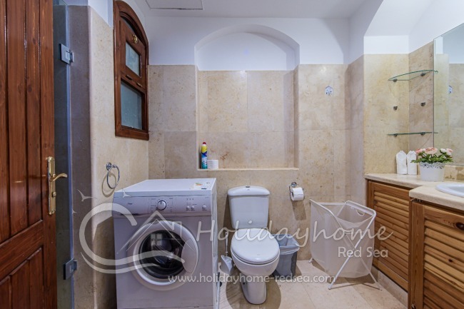 Big bathroom with shower and washing machine