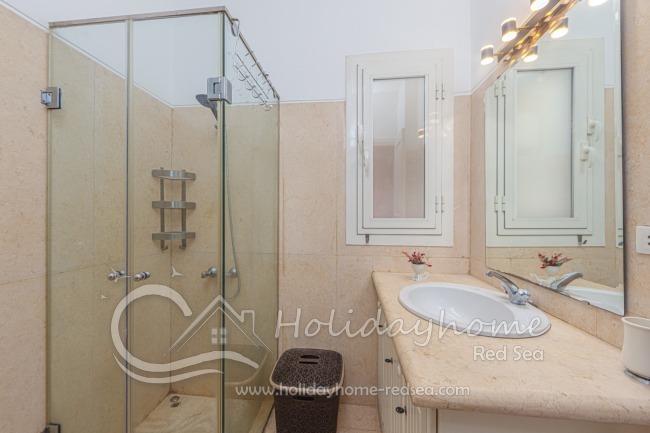 Ensuite bathroom with shower.