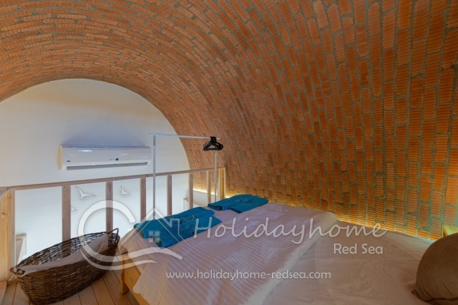 Loft bed with clothes rak