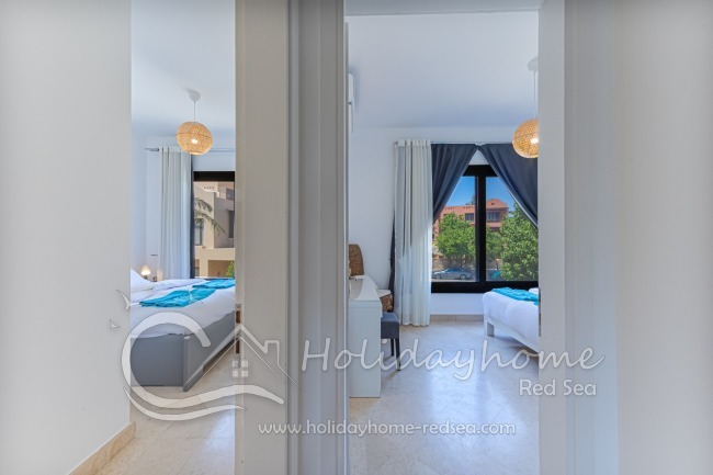 Entrance to bedroom 1 (left) and entrance to bedroom 2 (right)