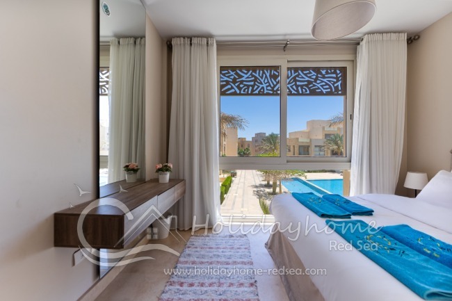 Large bed, build-in wardrobe and commode
