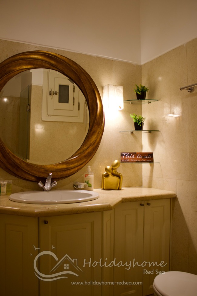 Bathroom with large mirror and shower